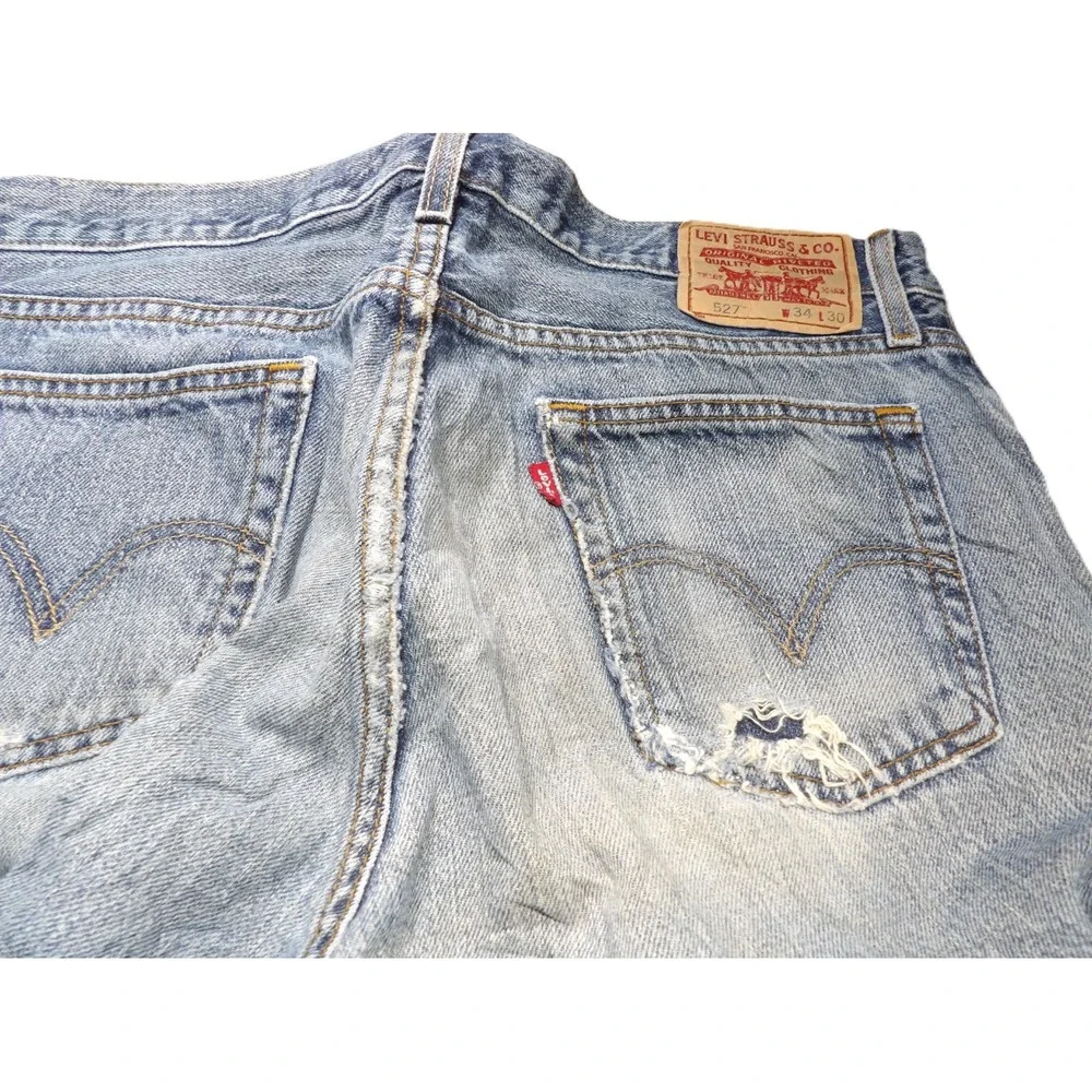 VTG Y2K Levi's 527 Low Boot Cut Jeans Men 34x30 Distressed Light Blue Denim Logo